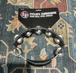 Latin Percussion Lp150 Cyclops Handheld Tambourine - Black With Steel Jingles. Fixed Price $34.99.